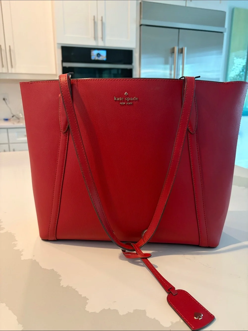 kate spade red leather tote with hanging tag